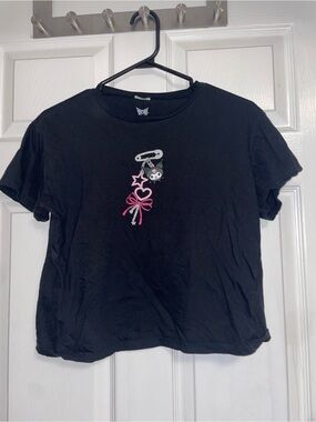 Sanrio Black Tee with Pink Bow and Charm Graphic